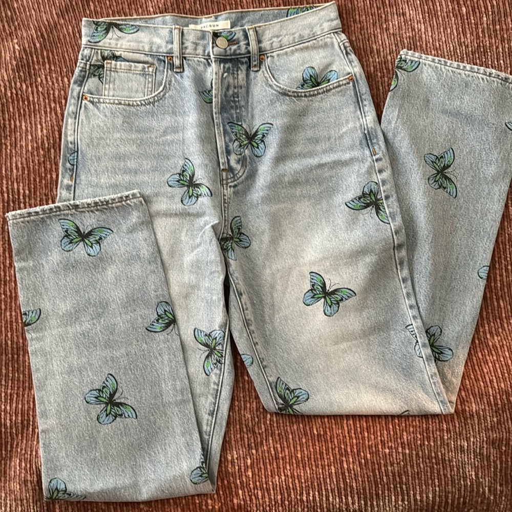 Size 27 butterfly design wide leg PacSun light wash jeans.
